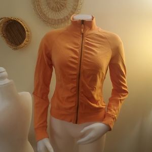 One Step Up Orange Zippy